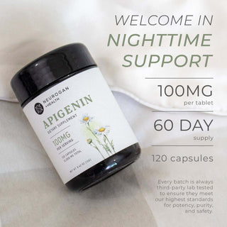Apigenin bottle on soft white fabric with product highlights: 100mg per tablet, 60-day supply.