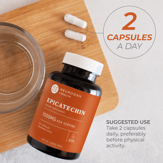 Epicatechin capsules on a wooden surface with a glass, promoting muscle growth and exercise performance.