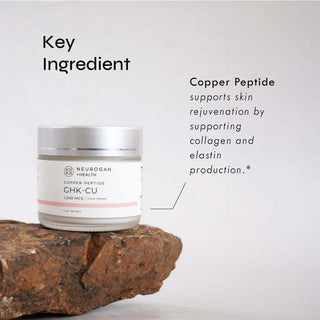 GHK-Cu Copper Peptide Face Cream jar on stone background, highlighting skin rejuvenation benefits.