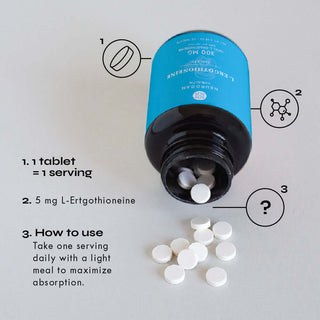 Opened bottle of L-Ergothioneine Tablets with serving instructions - take daily with a light meal for best absorption.