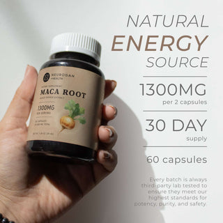Hand holding Maca Root bottle with 1300mg per serving and 30-day supply details.