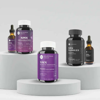 Neurogan Health NMN supplements displayed on a minimalist podium, including capsules, gummies, and liquid drops.