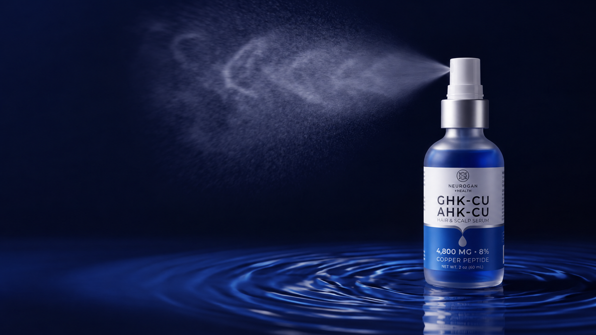 AHK-Cu + GHK-Cu Hair Serum Pro spray bottle releasing a fine mist