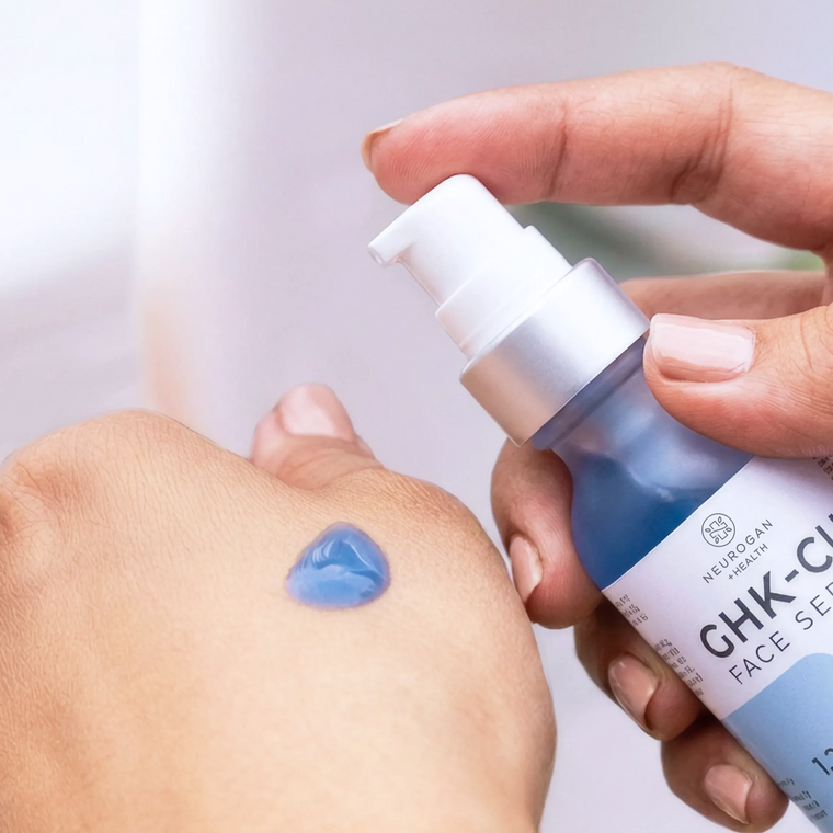 Pumping blue serum onto the back of the hand