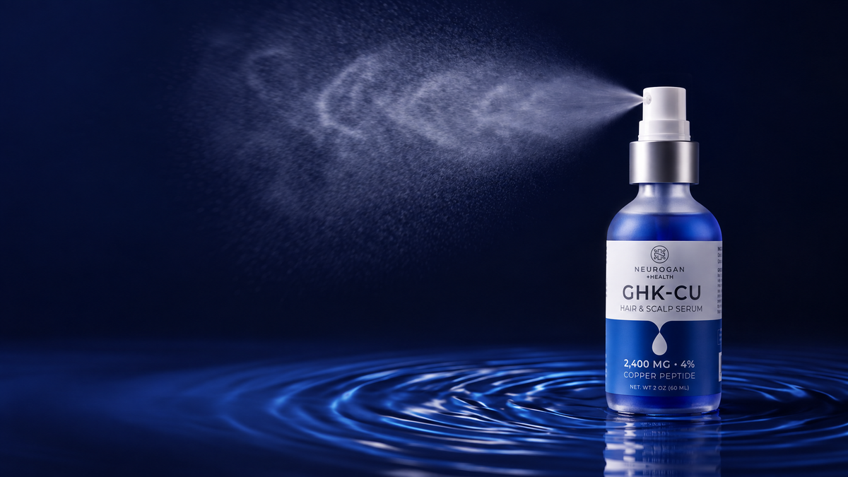 GHK-Cu Hair & Scalp Serum spray bottle releasing a fine mist