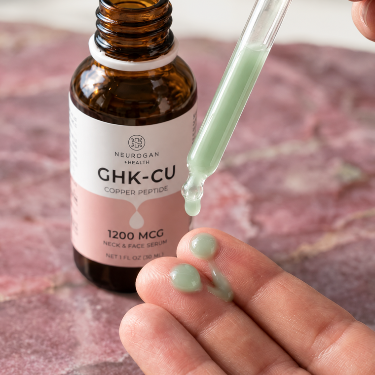 Drops of serum from the dropper onto a fingertip