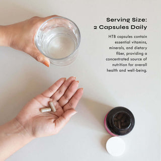HTB capsules daily serving, instruction to take with water. Provides essential vitamins, minerals, and dietary fiber for well-being.
