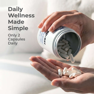NAD + Resveratrol Capsules in hand, promoting daily wellness with only 2 capsules daily for cellular health.