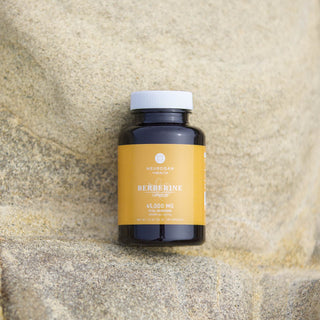 Neurogan Berberine capsules bottle on a textured stone surface, 45,000 MG dosage.