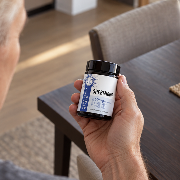 Holding a jar of Spermidine Tablets