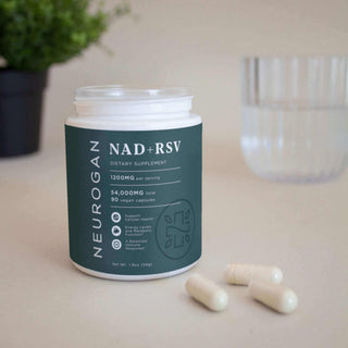 NAD+RSV dietary supplement by Neurogan in a white jar, featuring vegan capsules for energy and wellness.