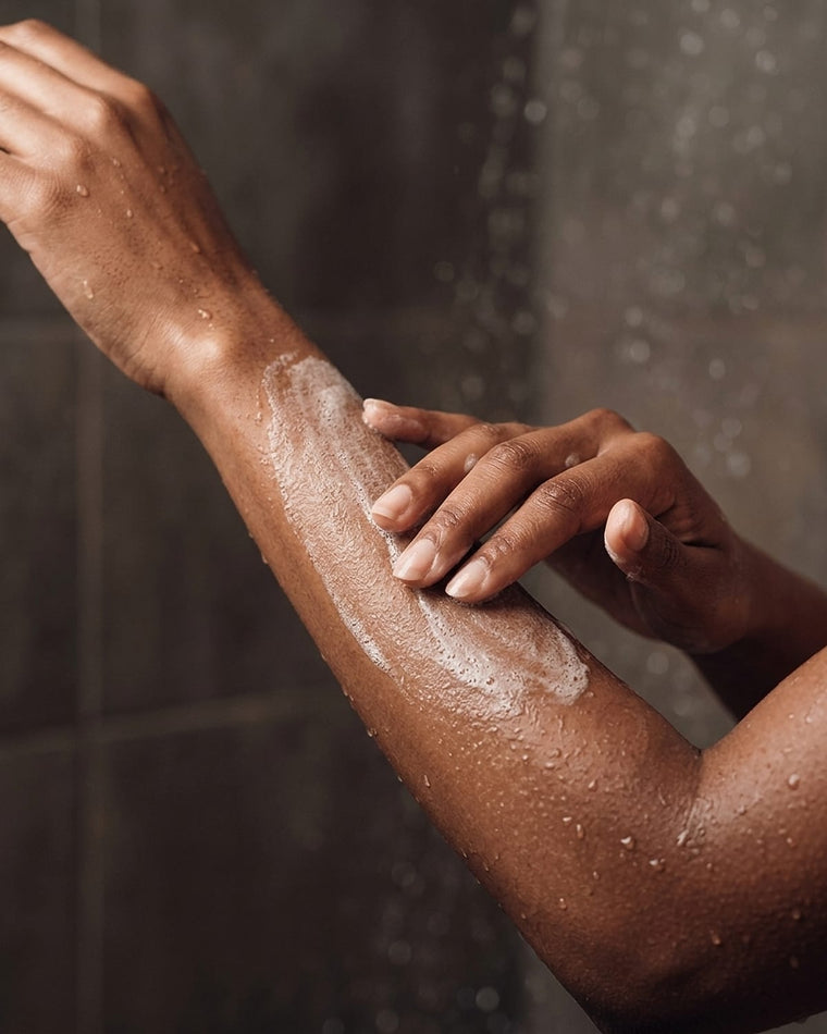 A light layer of lather resting on a forearm