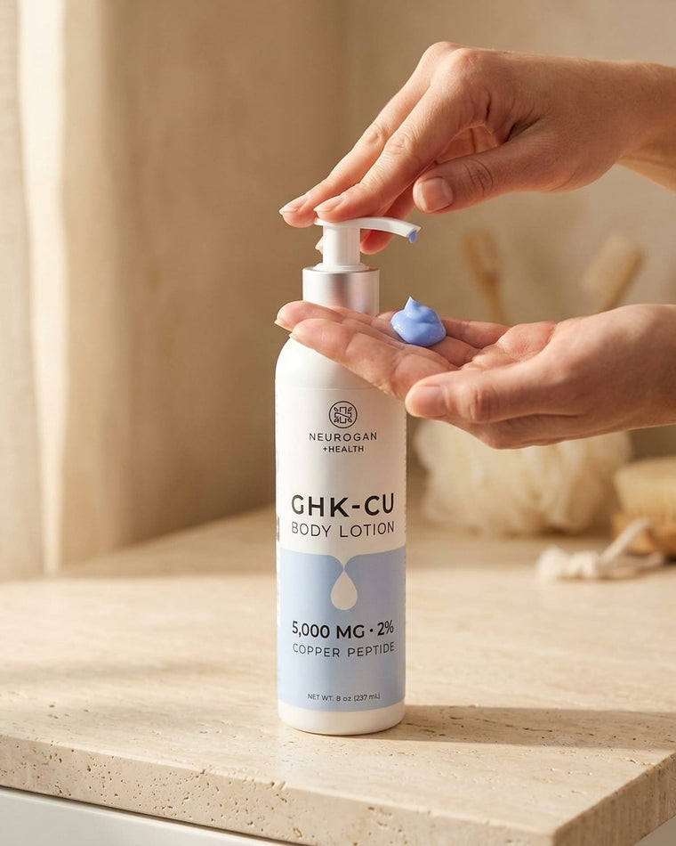 A hand pressing the pump of the GHK-Cu Body Lotion bottle into an open palm