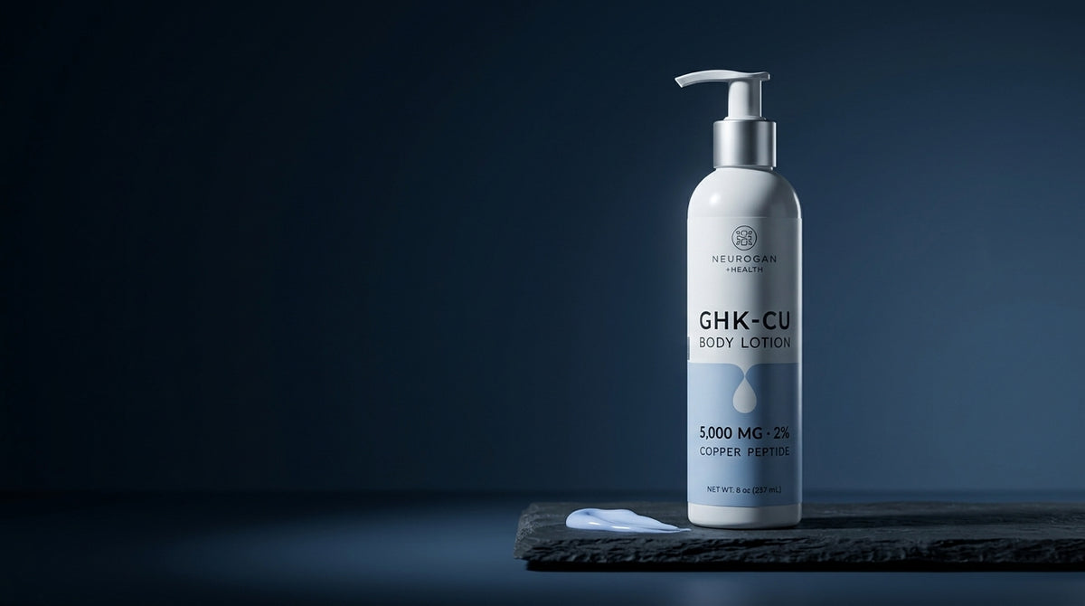 GHK-Cu Body Lotion pump bottle on a dark slate ledge beside a ribbon of pale blue lotion
