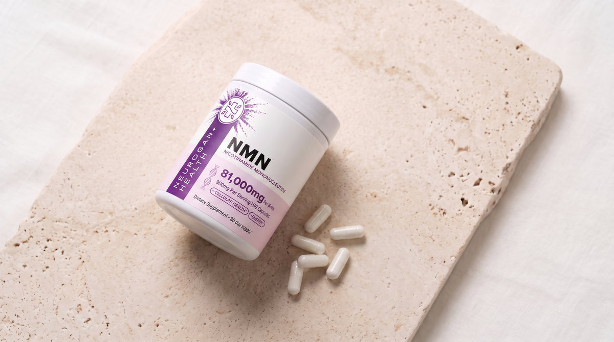 NMN Capsules 900 mg jar on pale sand travertine with white capsules